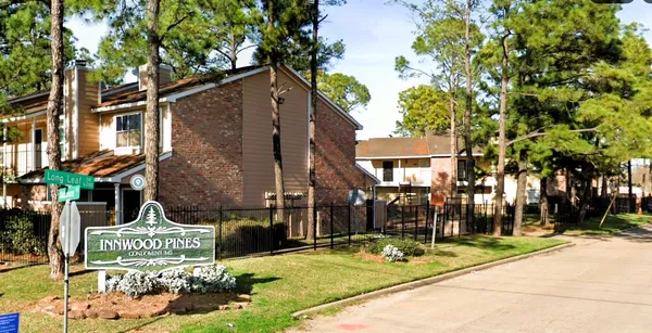 a front view of a building with street view