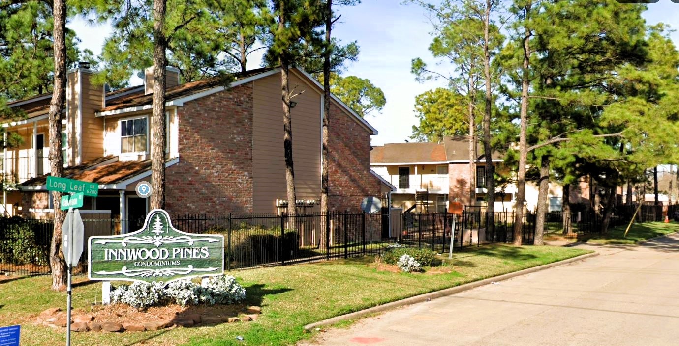 a front view of a building with street view