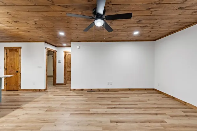 a bathroom with a toilet sink and shower