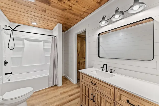 a view of porch with wooden floor