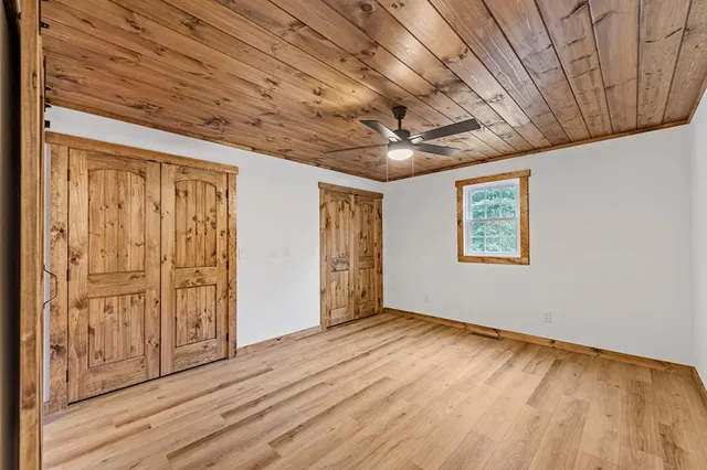 a view of balcony with wooden floor