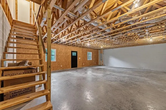 a view of outdoor space with deck and trees