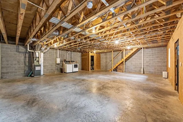 an outdoor view of a house with a balcony