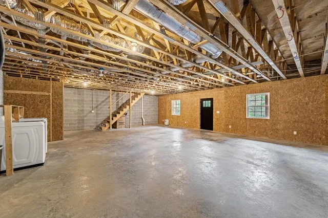 a view of a windows and brick walls