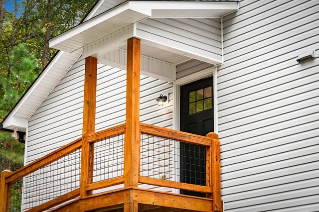 a kitchen with granite countertop a sink and a window