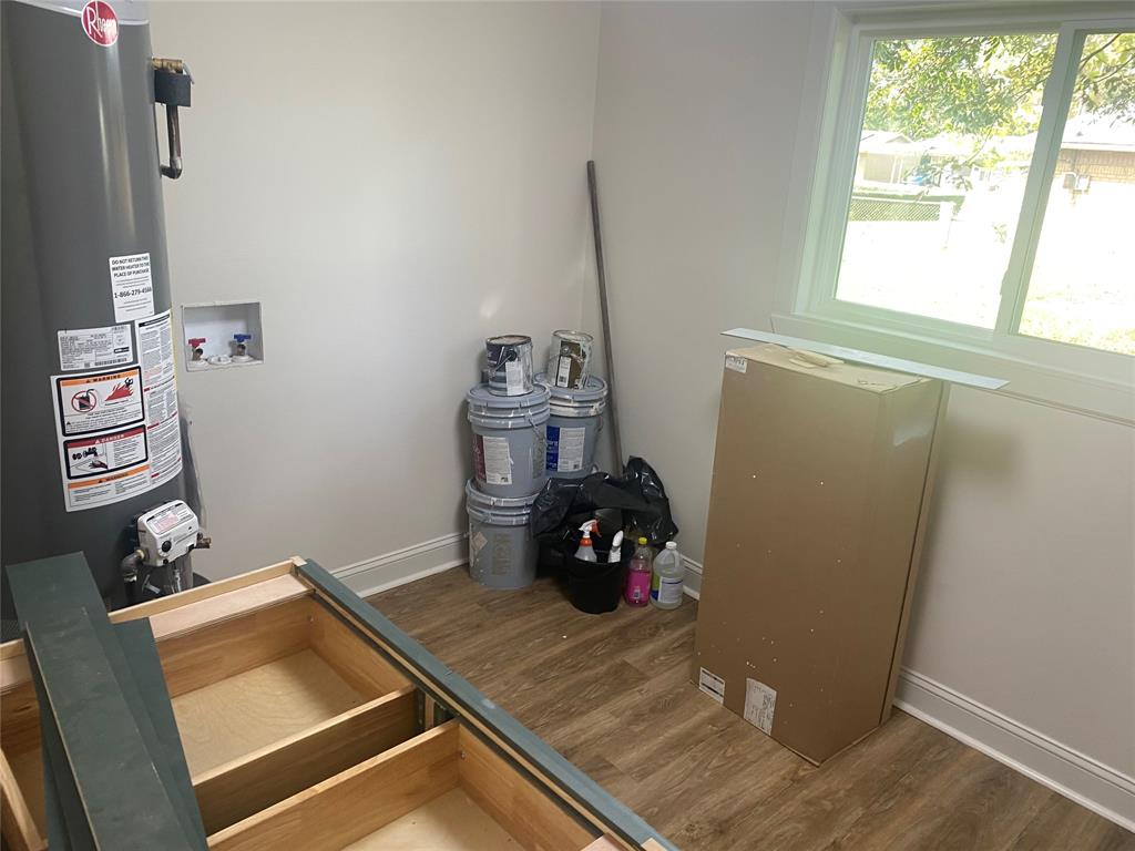 1609 Northgate Road Bossier City, LA 71112 - Photo 12 of 17 a room with storage and utility