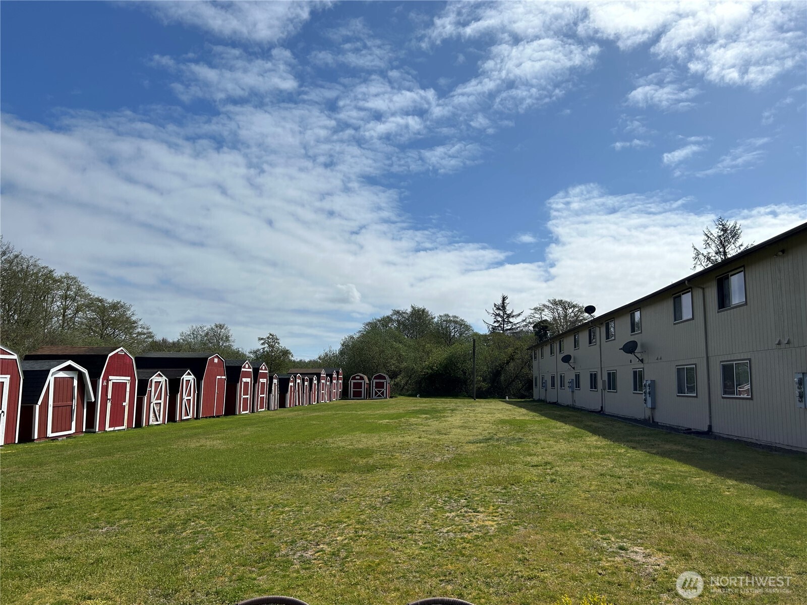 1420 48th Street, Unit B10 Seaview, WA 98644 - Photo 20 of 20 a view of building with garden