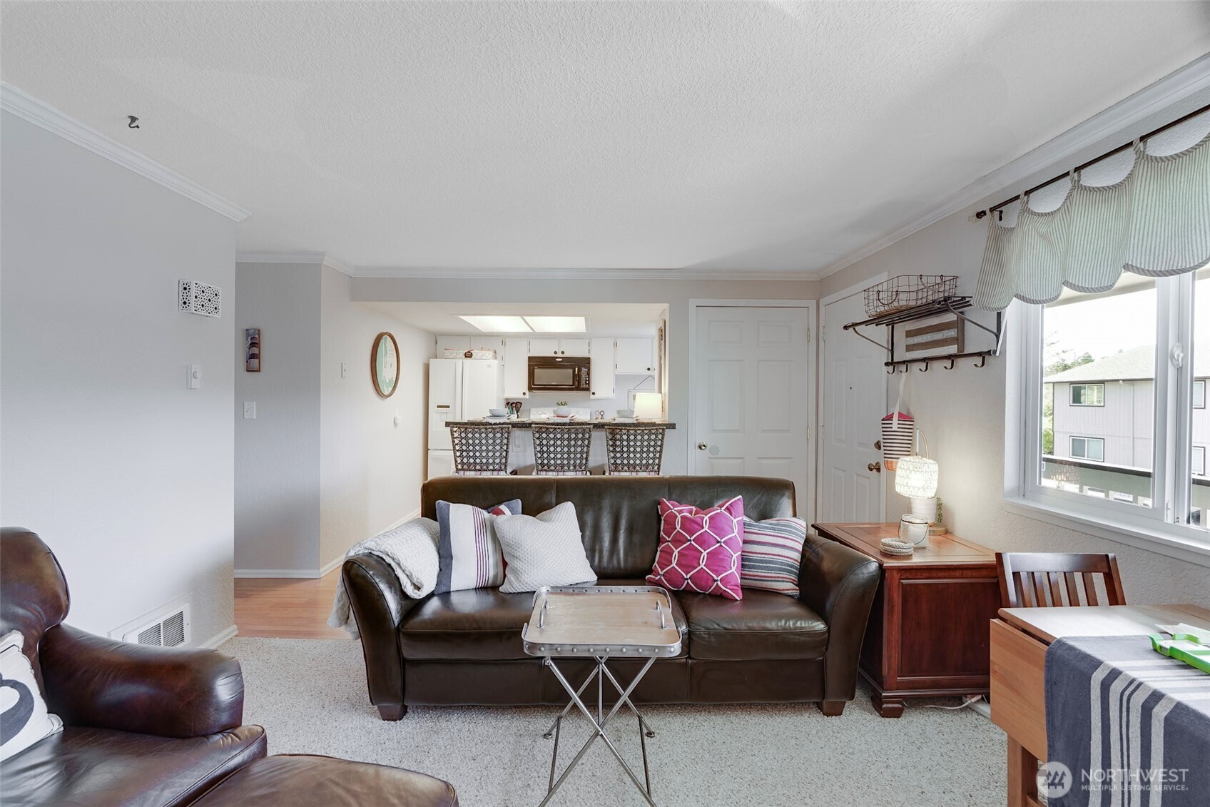 1420 48th Street, Unit B10 Seaview, WA 98644 - Photo 3 of 20 a living room with furniture and a couch
