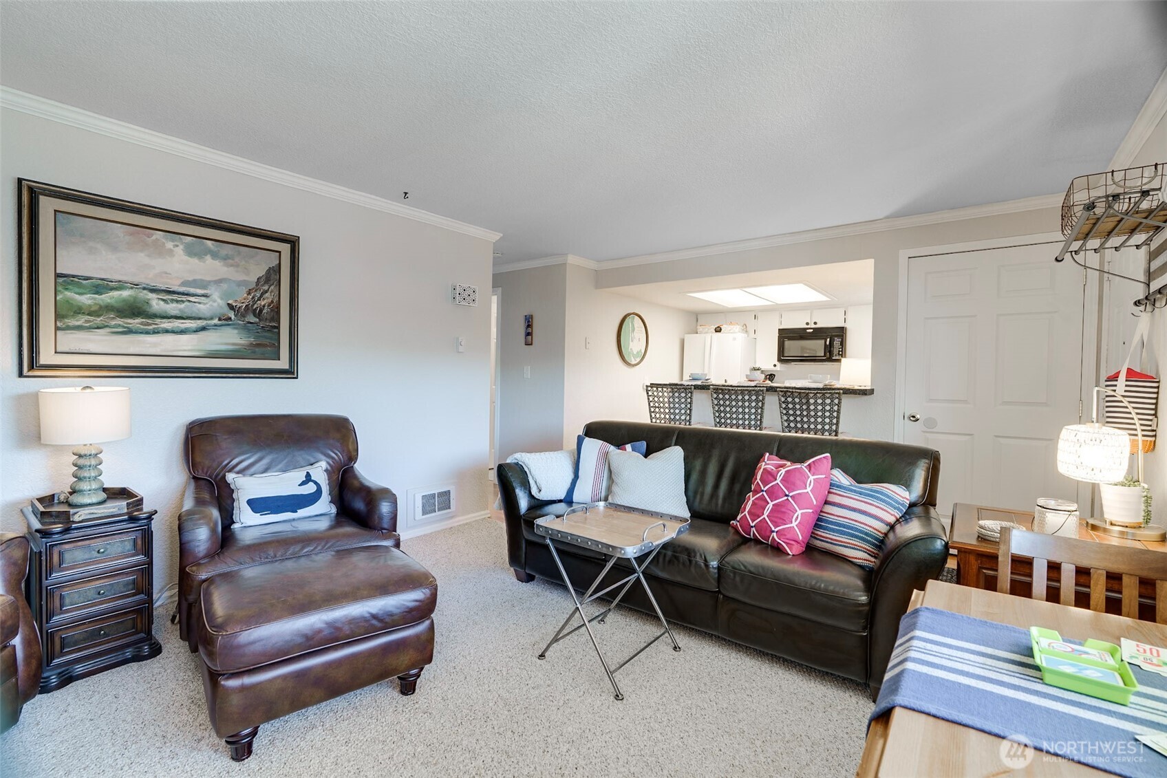 1420 48th Street, Unit B10 Seaview, WA 98644 - Photo 4 of 20 a living room with furniture and a window