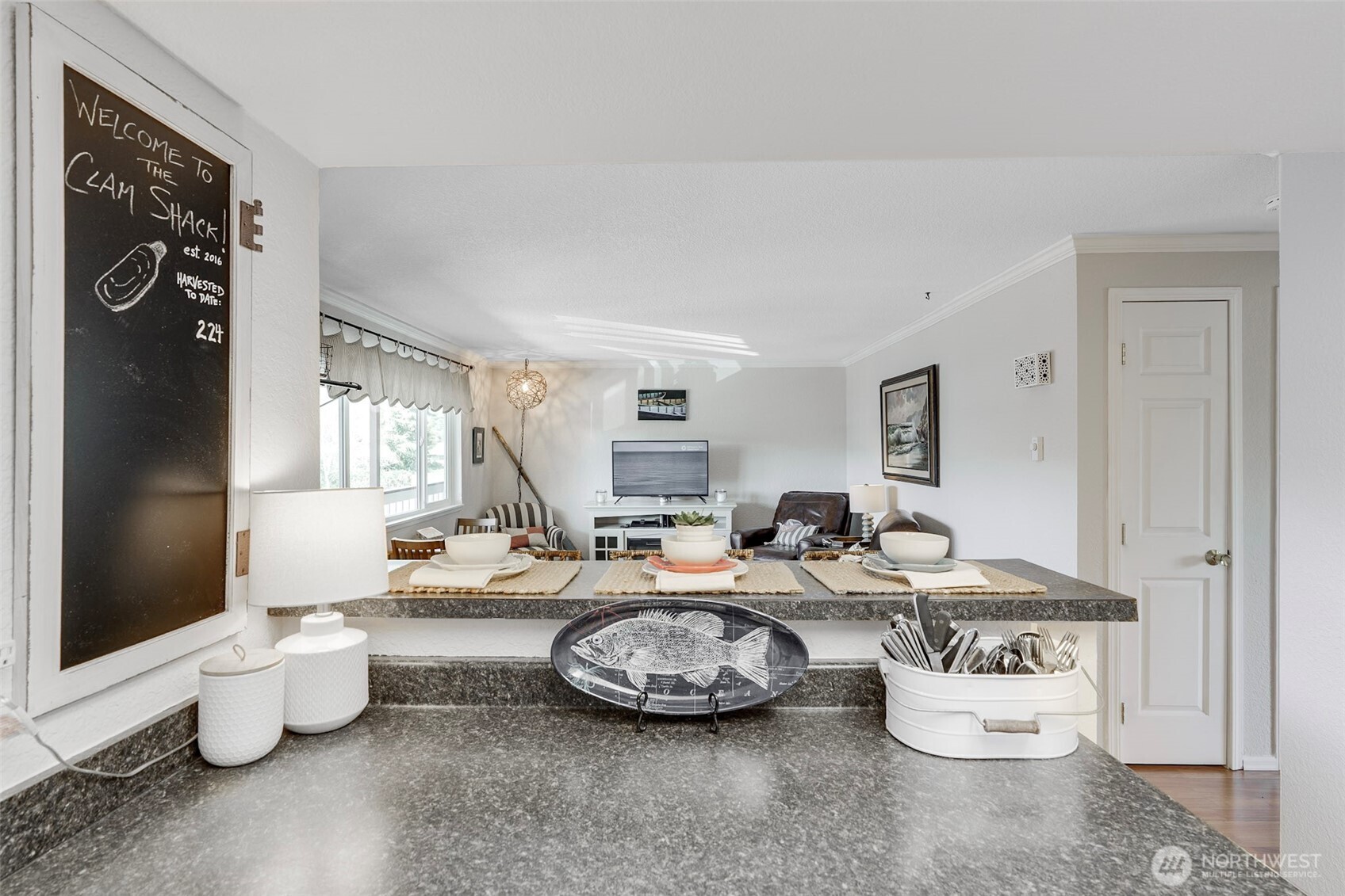 1420 48th Street, Unit B10 Seaview, WA 98644 - Photo 10 of 20 a living room with furniture and a table