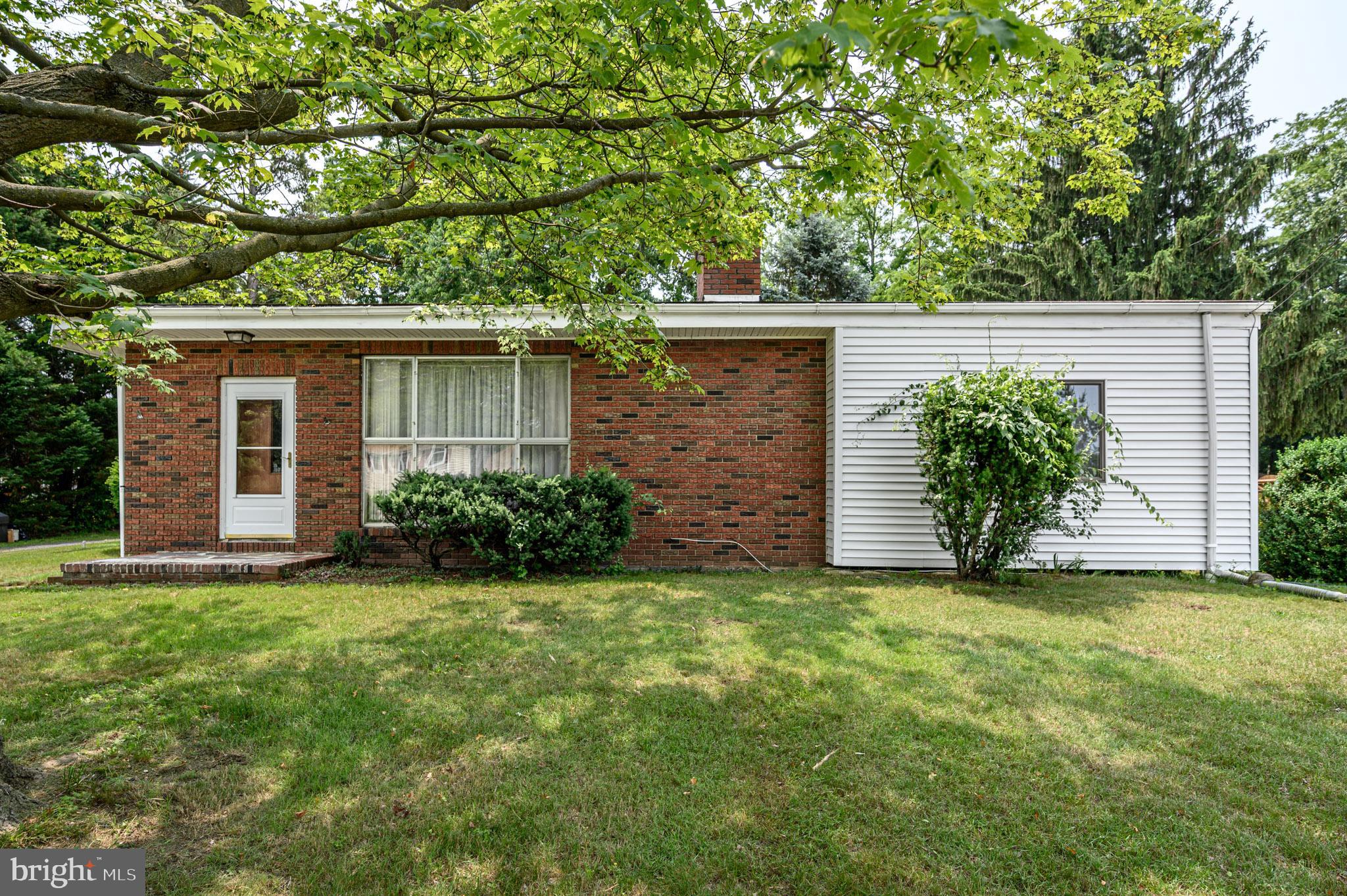 861 Centerton Road Mount Laurel, NJ 08054 - Photo 1 of 43 a view of a backyard with potted plants and large tree