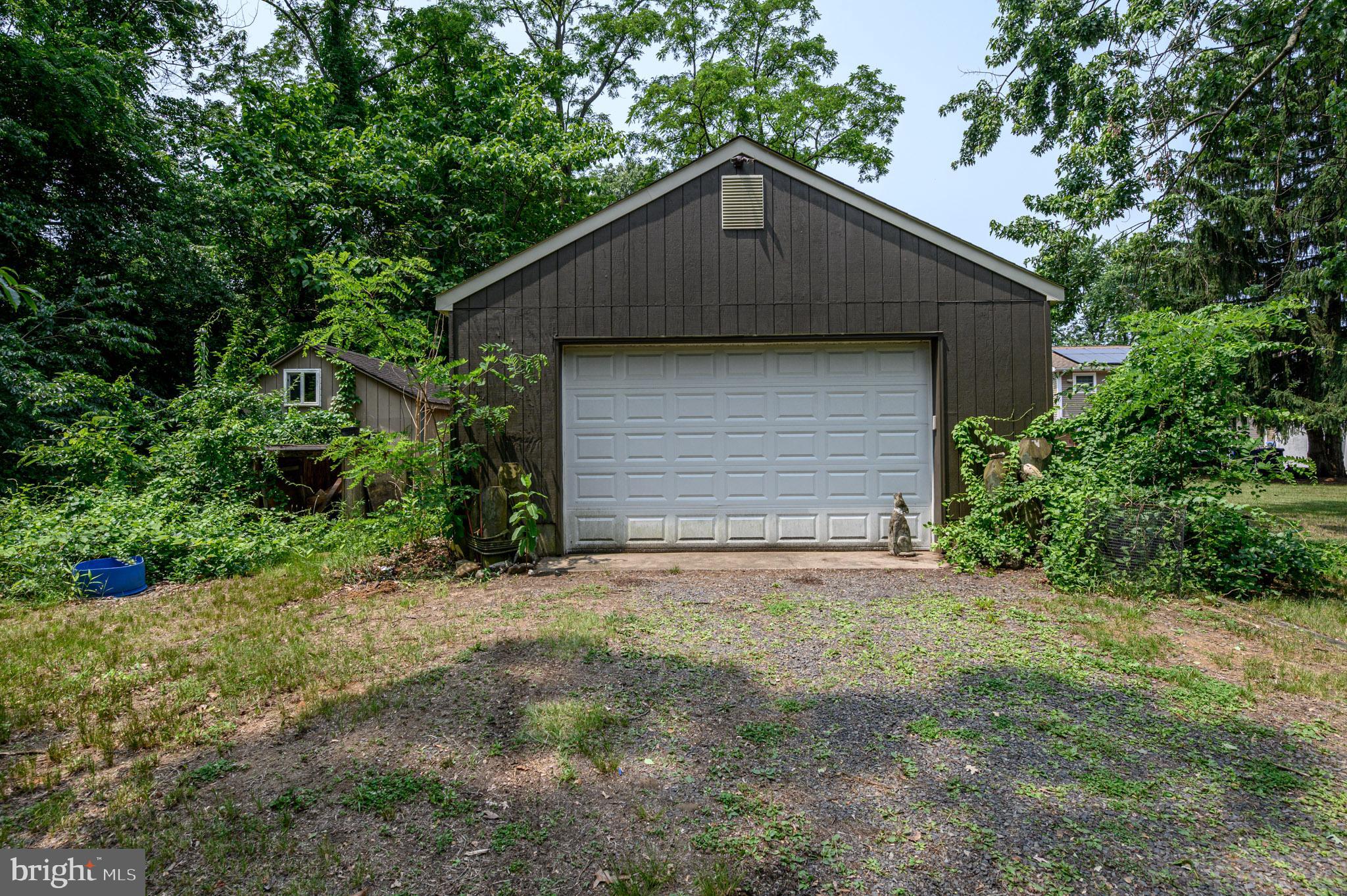 861 Centerton Road Mount Laurel, NJ 08054 - Photo 38 of 43 a front view of a house with a yard and garage