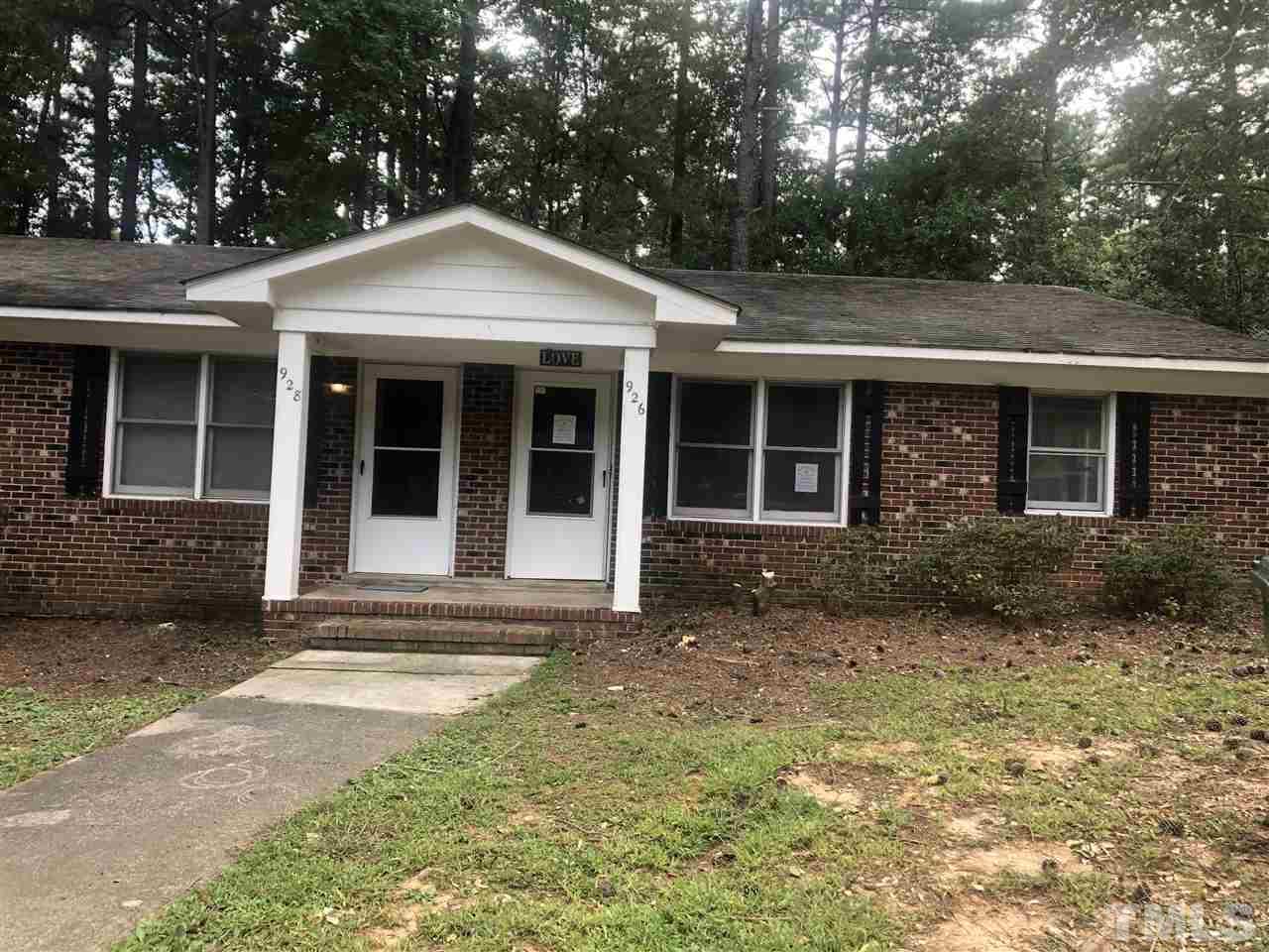 926 Jason Court Cary, NC 27511 - Photo 1 of 10 a front view of a house with garden