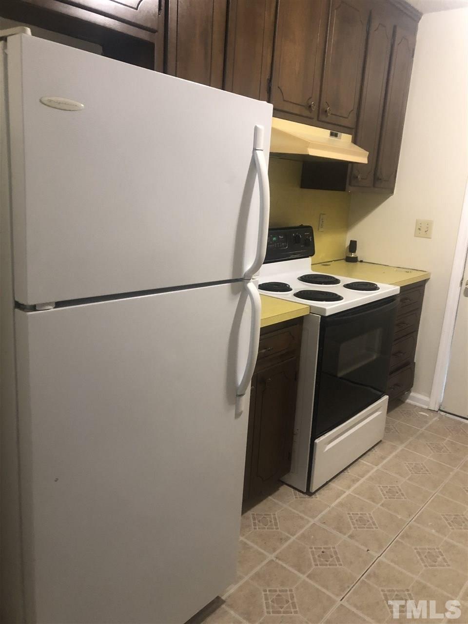 926 Jason Court Cary, NC 27511 - Photo 3 of 10 a utility room with dryer and washer