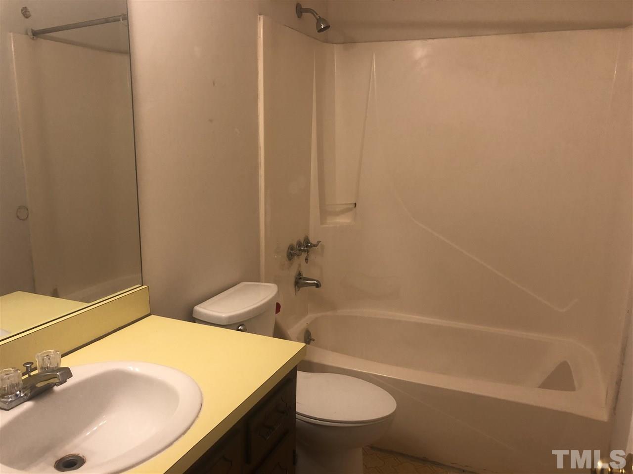 926 Jason Court Cary, NC 27511 - Photo 7 of 10 a bathroom with a sink toilet and shower