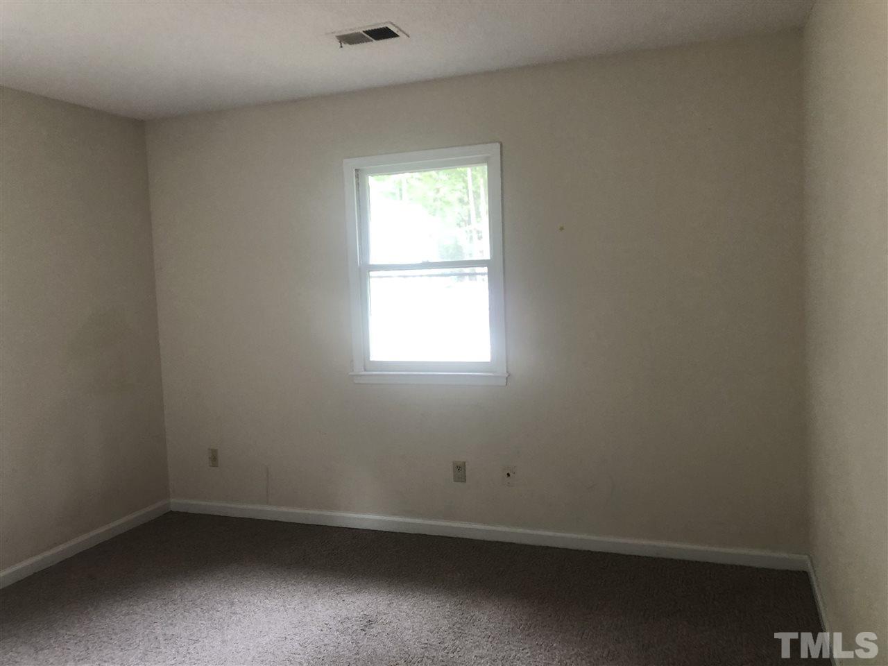 926 Jason Court Cary, NC 27511 - Photo 8 of 10 an empty room with a window