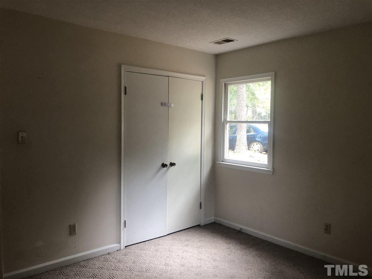926 Jason Court Cary, NC 27511 - Photo 9 of 10 a view of an empty room with a window