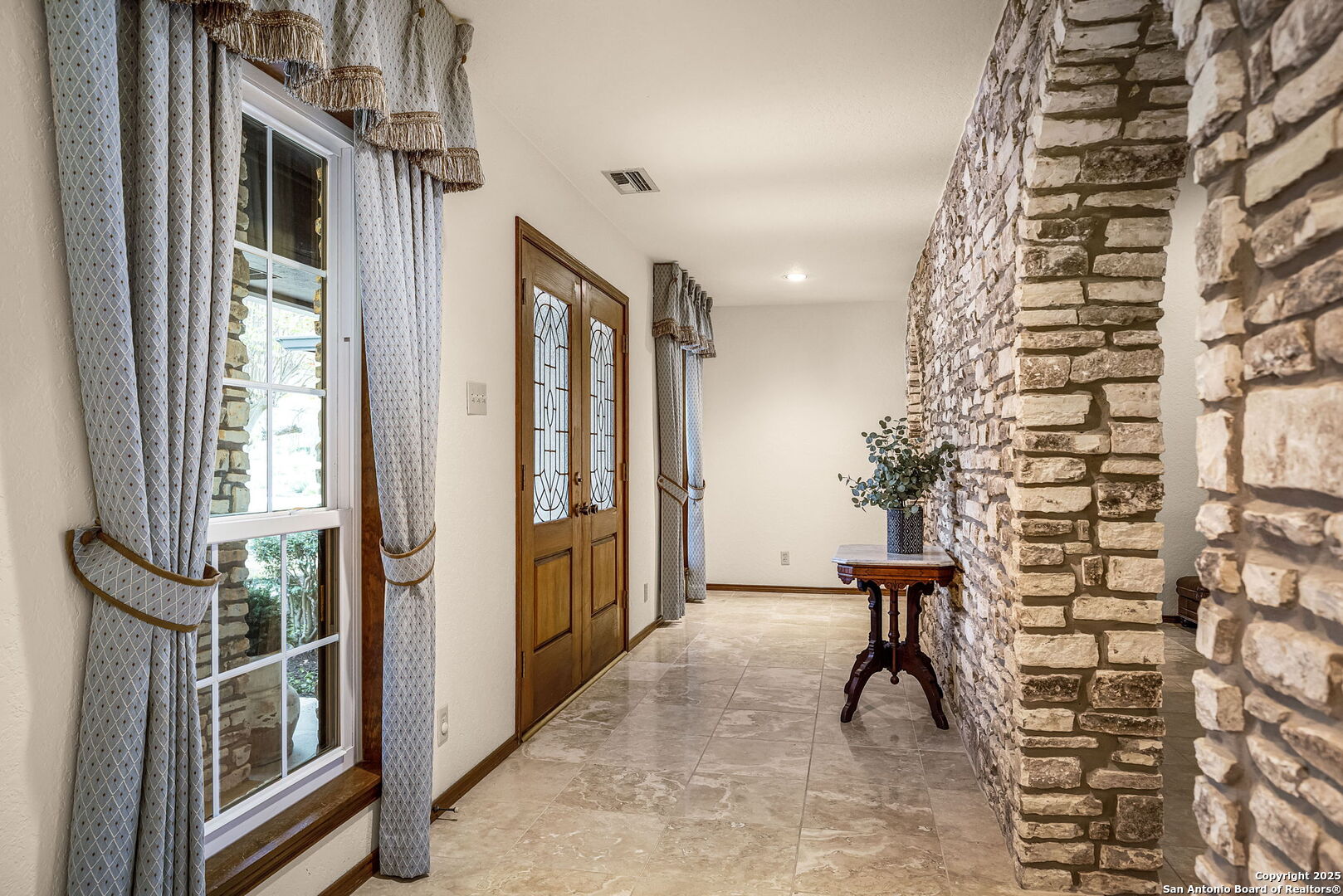 9606 Meadow Rue Garden Ridge, TX 78266 - Photo 14 of 60 a view of entryway with furniture and front door