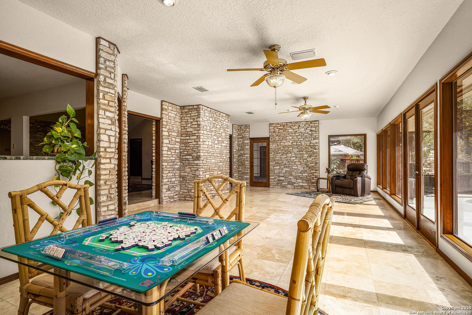 9606 Meadow Rue Garden Ridge, TX 78266 - Photo 31 of 60 a living room with furniture and a table