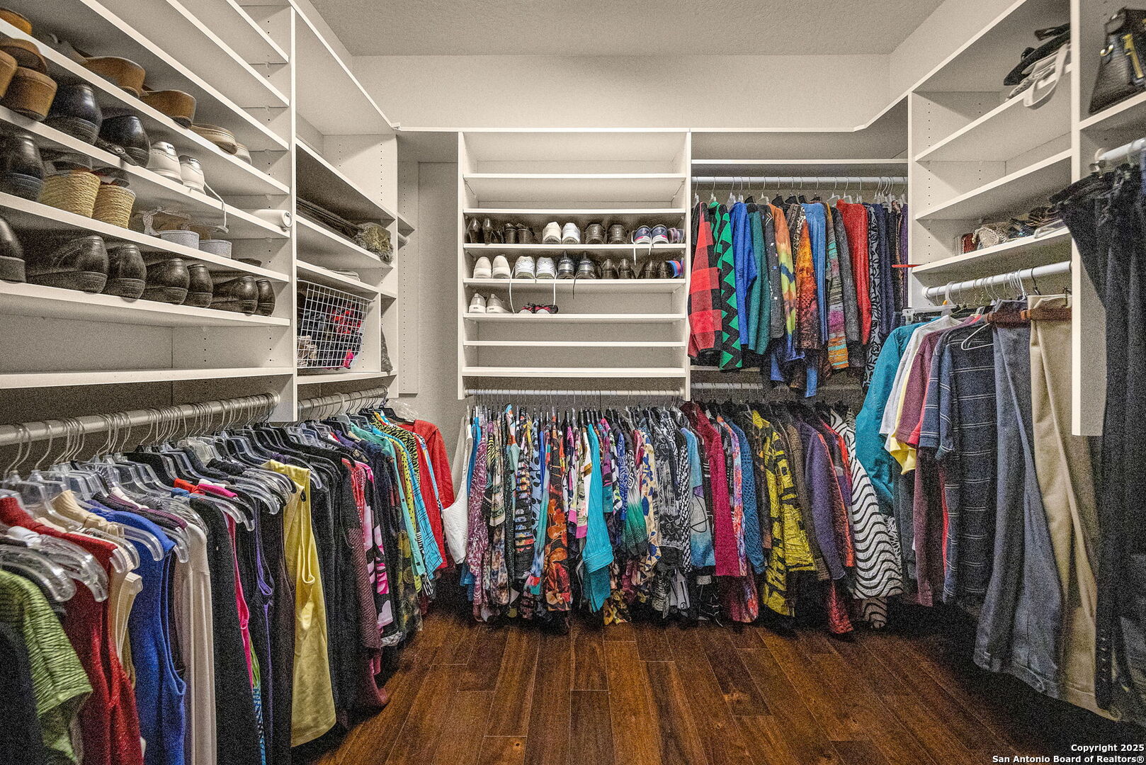 9606 Meadow Rue Garden Ridge, TX 78266 - Photo 50 of 60 a view of walk in closet with clothes