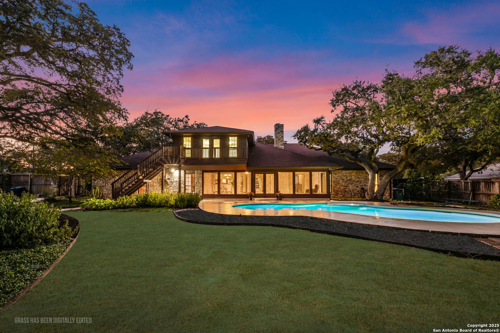 9606 Meadow Rue Garden Ridge, TX 78266 - Photo 56 of 60 a front view of a house with a yard table and chairs