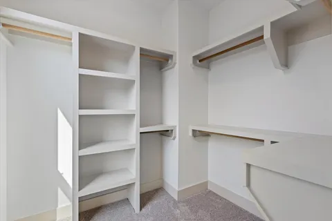 a view of an empty walk in closet