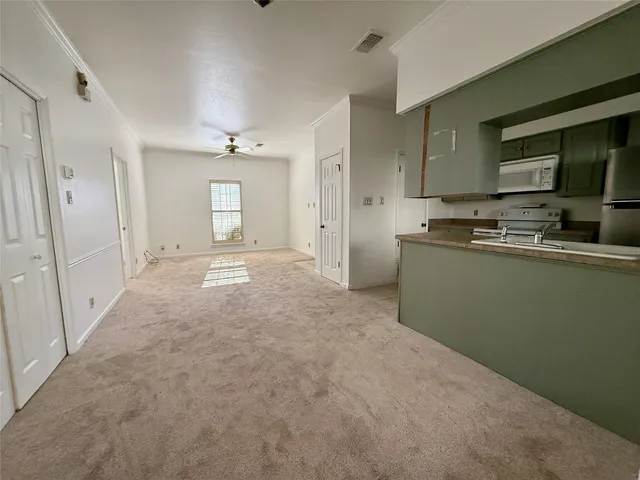 a view of kitchen with wooden floor