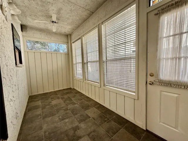 a view of a house with a large window