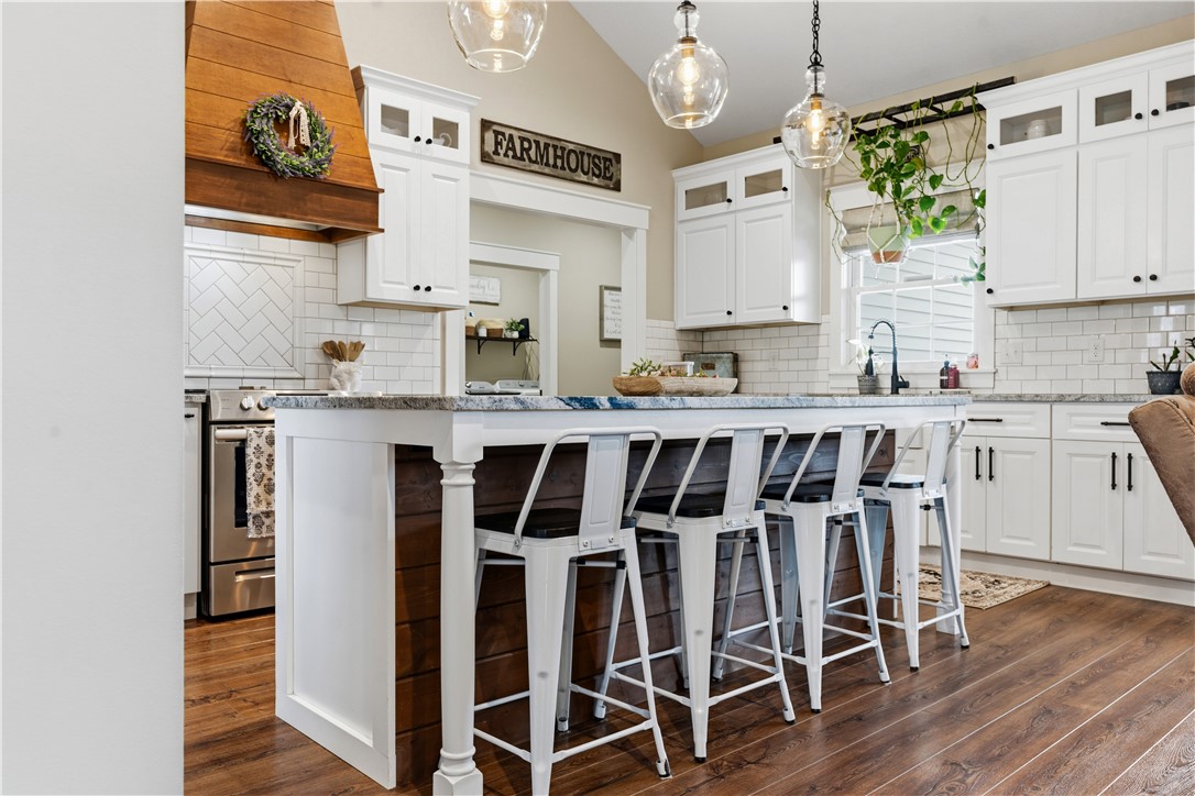 1158 Pyle Road Clarksville, OH 45113 - Photo 25 of 76 Bright and airy kitchen featuring an island with seating, perfect for casual dining and entertaining.
