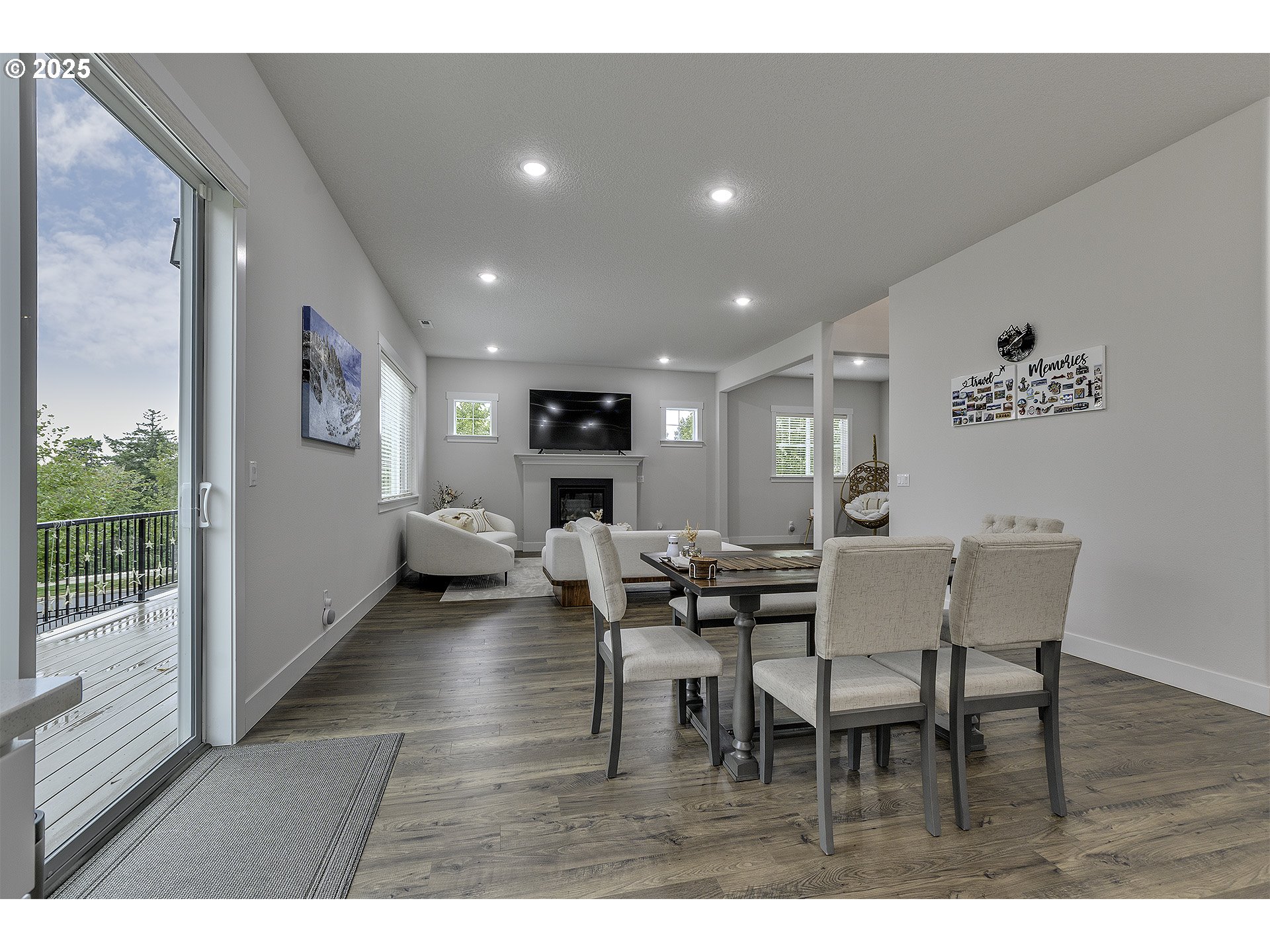 15080 Northwest Legend Street Portland, OR 97229 - Photo 15 of 38 a view of a dining room with furniture and wooden floor