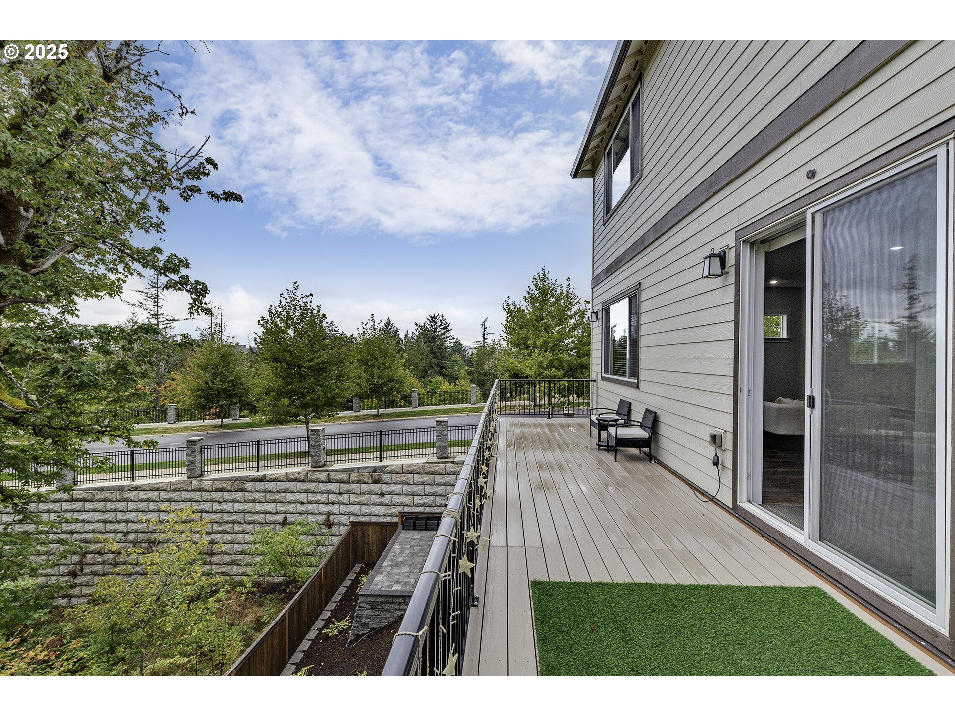 15080 Northwest Legend Street Portland, OR 97229 - Photo 16 of 38 a view of a backyard with sitting area