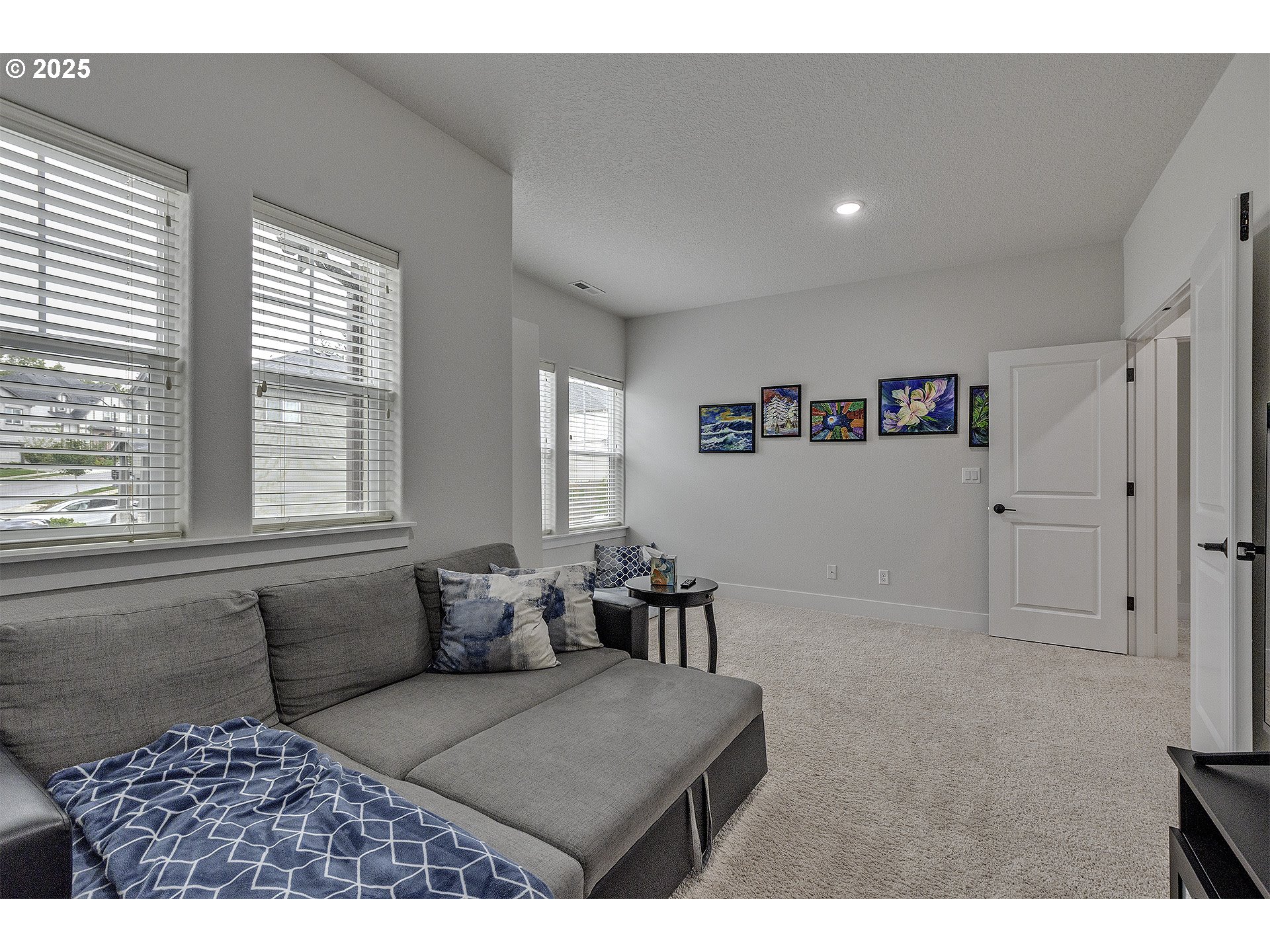15080 Northwest Legend Street Portland, OR 97229 - Photo 25 of 38 a living room with furniture and window