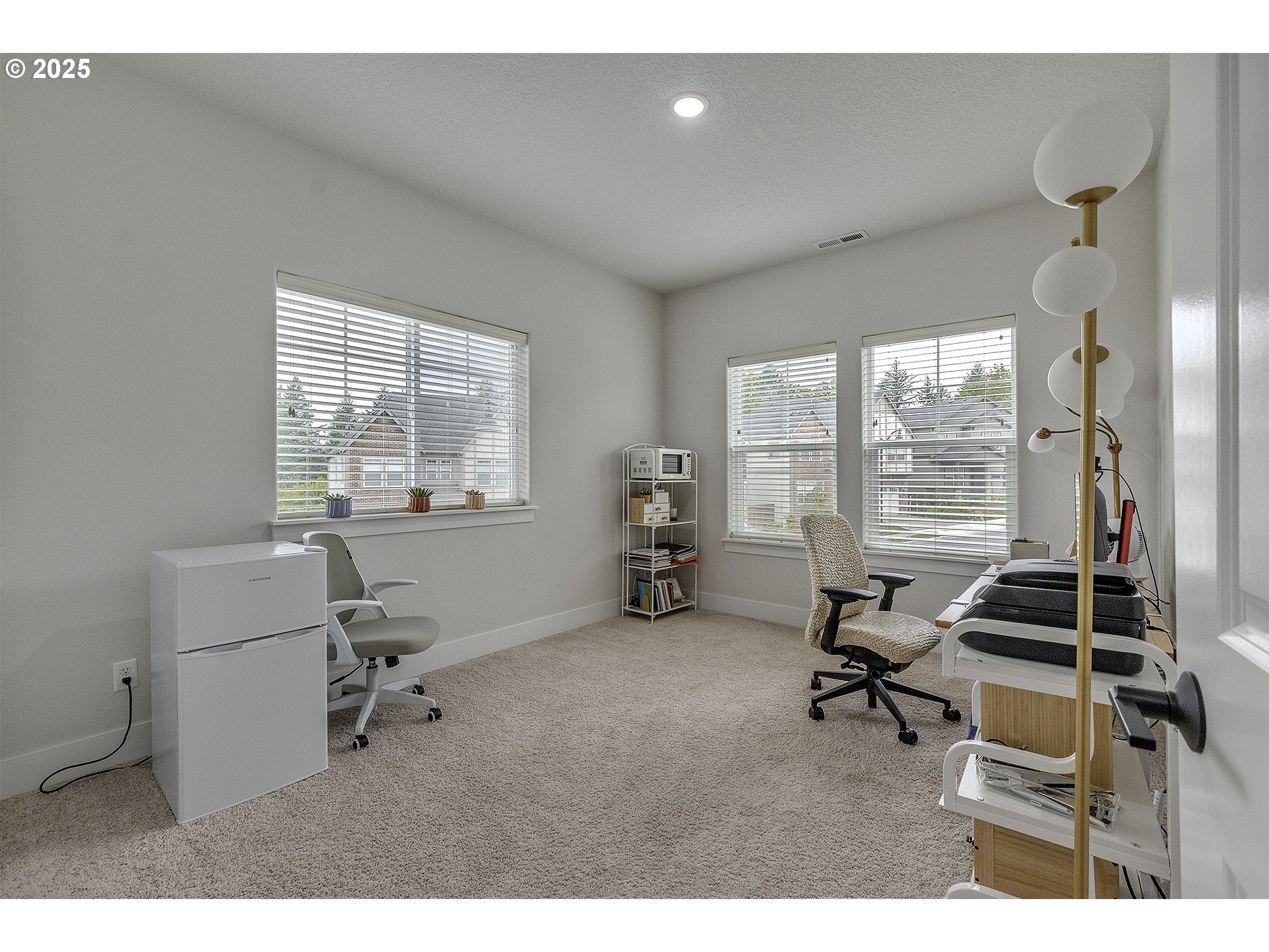 15080 Northwest Legend Street Portland, OR 97229 - Photo 26 of 38 a room with furniture