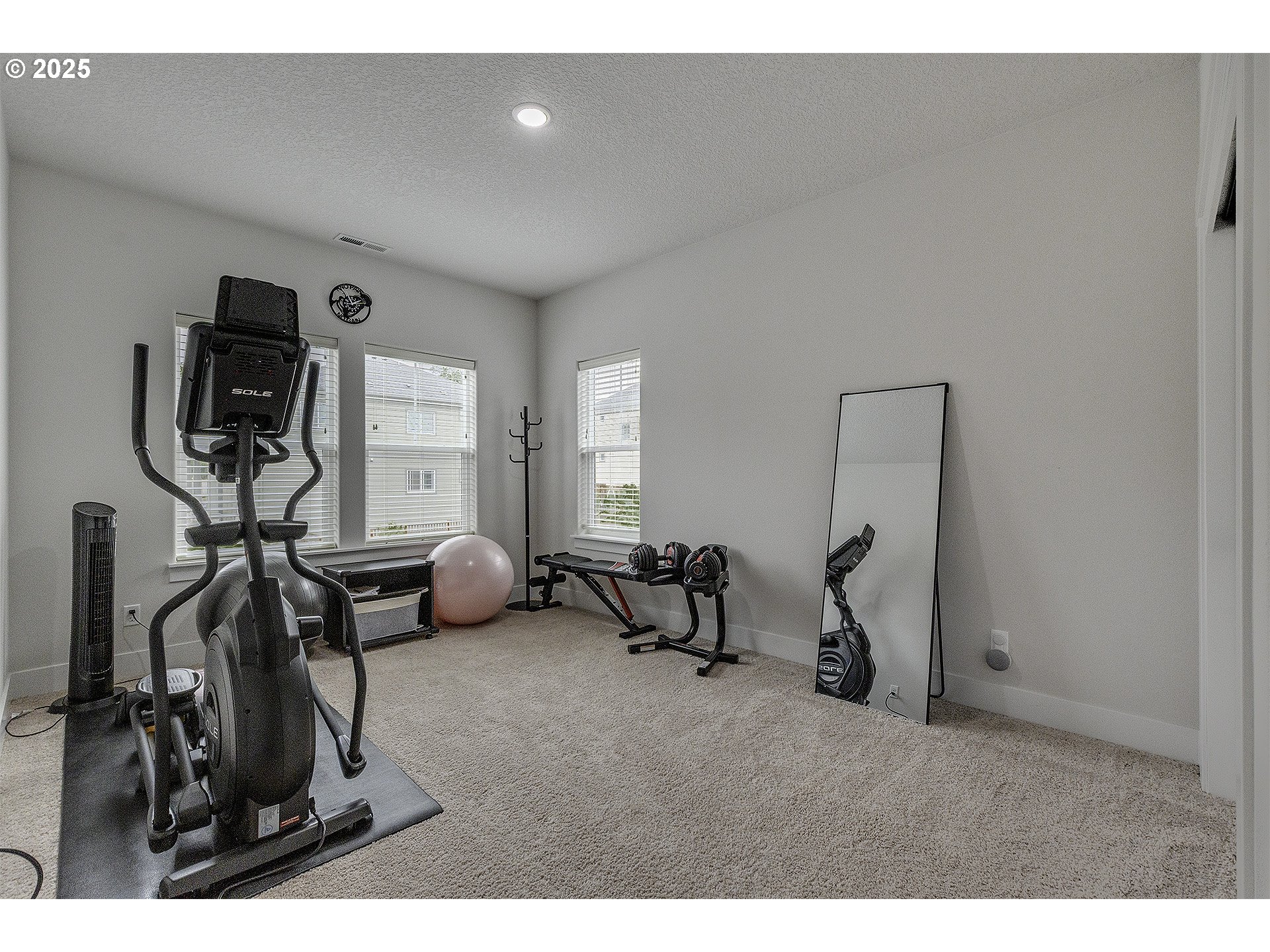 15080 Northwest Legend Street Portland, OR 97229 - Photo 28 of 38 a view of a room with gym equipment