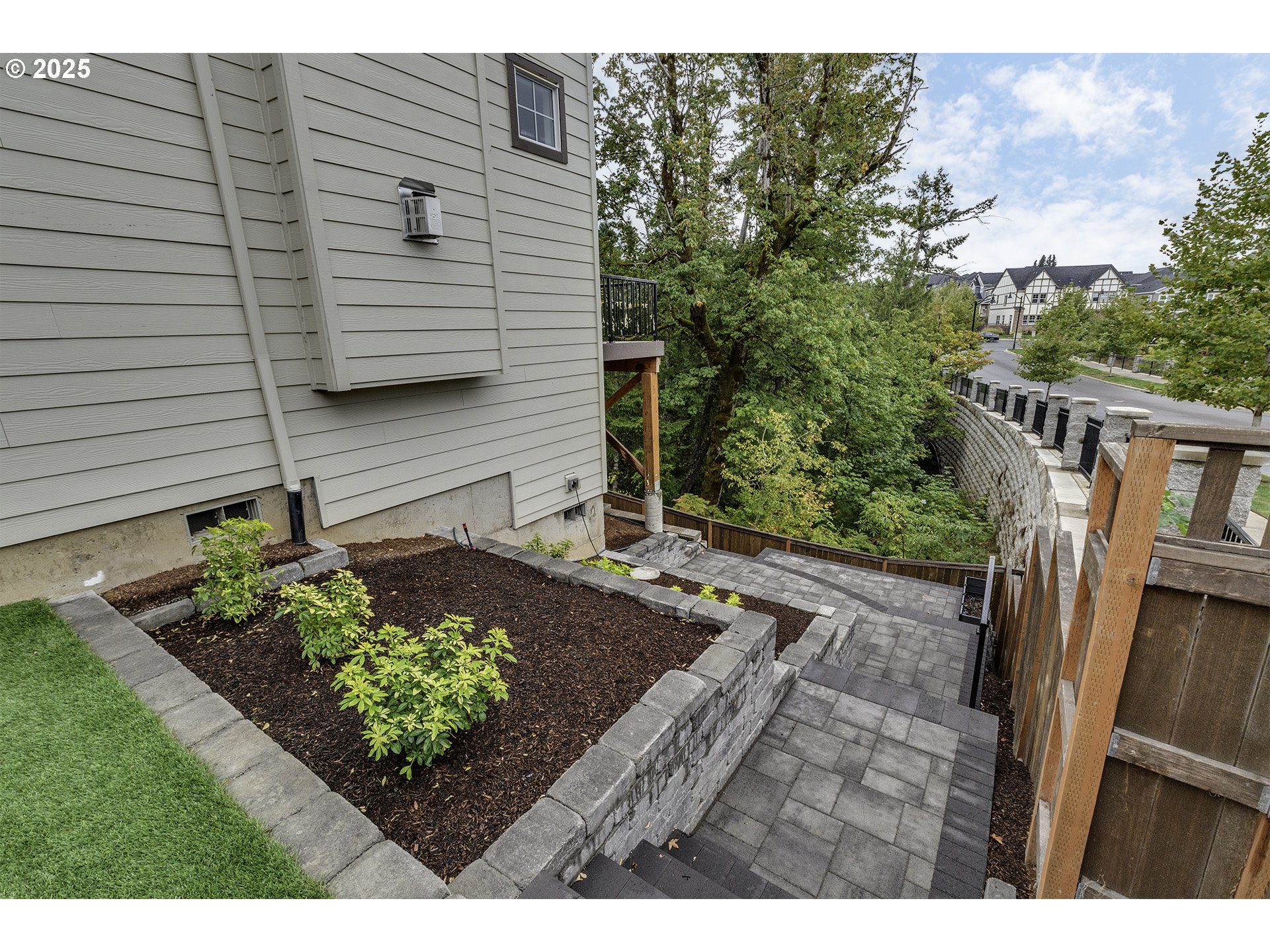 15080 Northwest Legend Street Portland, OR 97229 - Photo 33 of 38 a view of a backyard with sitting area