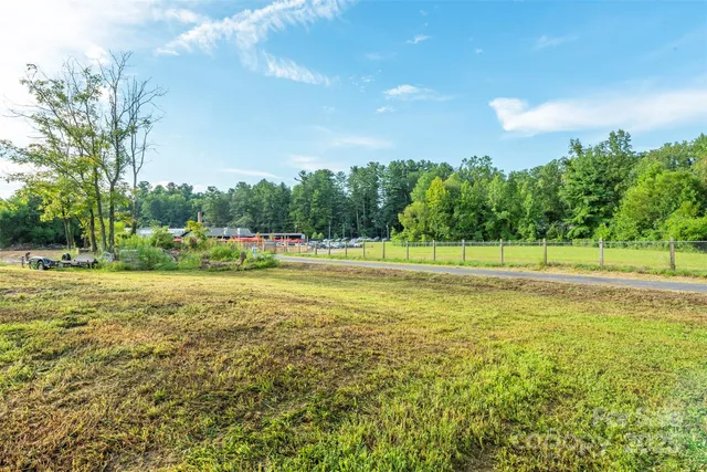 a view of a golf course with a lake