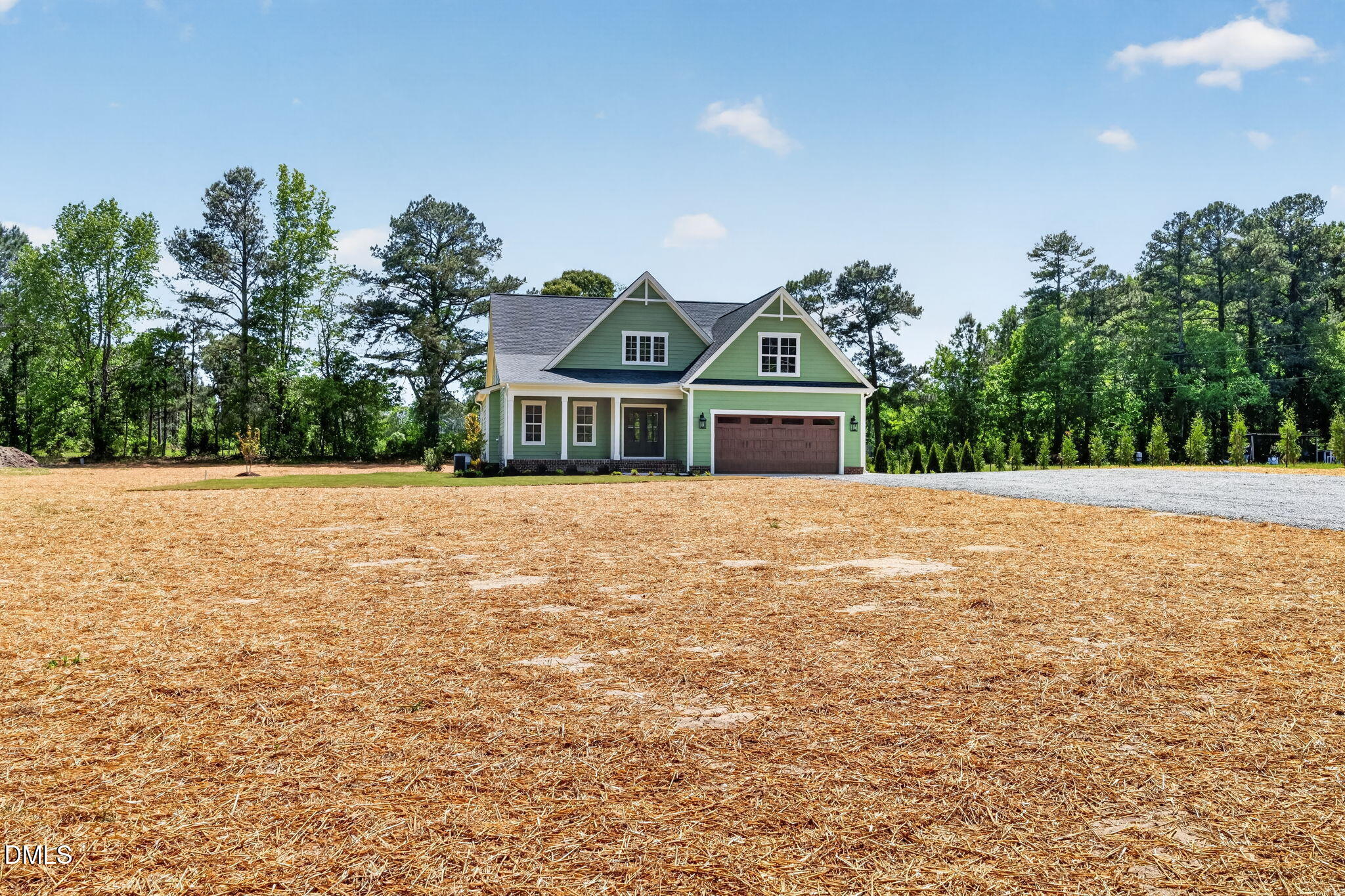 651 Dixon Road, Unit (LOT 2A) Willow Spring, NC 27592 - Photo 4 of 77 a front view of a house with a yard