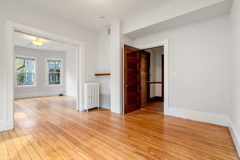 3 Adelaide Terrace, Unit 2 Boston, MA 02130 - Photo 5 of 16 wooden floor in an empty room
