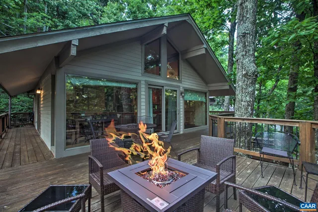 a view of a patio with a table chairs and a table