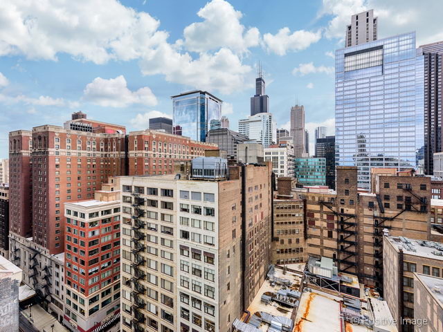 60 East Monroe Street, Unit 1906 Chicago, IL 60603 - Photo 20 of 20 a city view with tall buildings