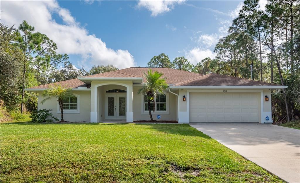 Open and updated 3 bedroom, 2 bath, 2 car garage canal front pool home with city water in up and coming North Port.