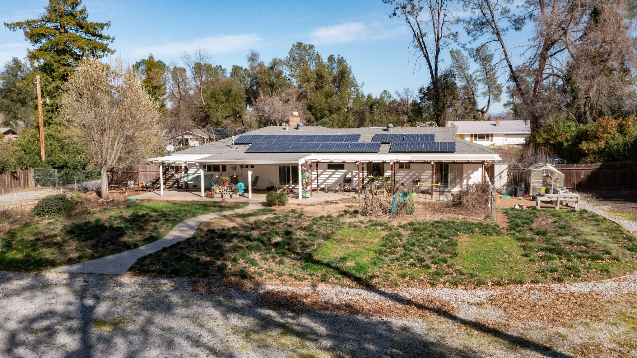 8790 Redbank Road Redding, CA 96001 - Photo 19 of 21 a view of a house with garden