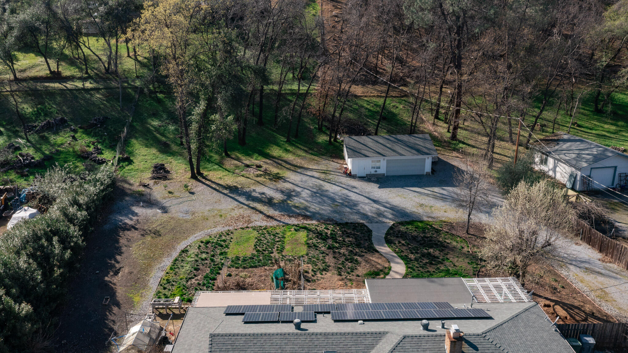 8790 Redbank Road Redding, CA 96001 - Photo 20 of 21 an aerial view of a house with a yard basket ball court and outdoor seating