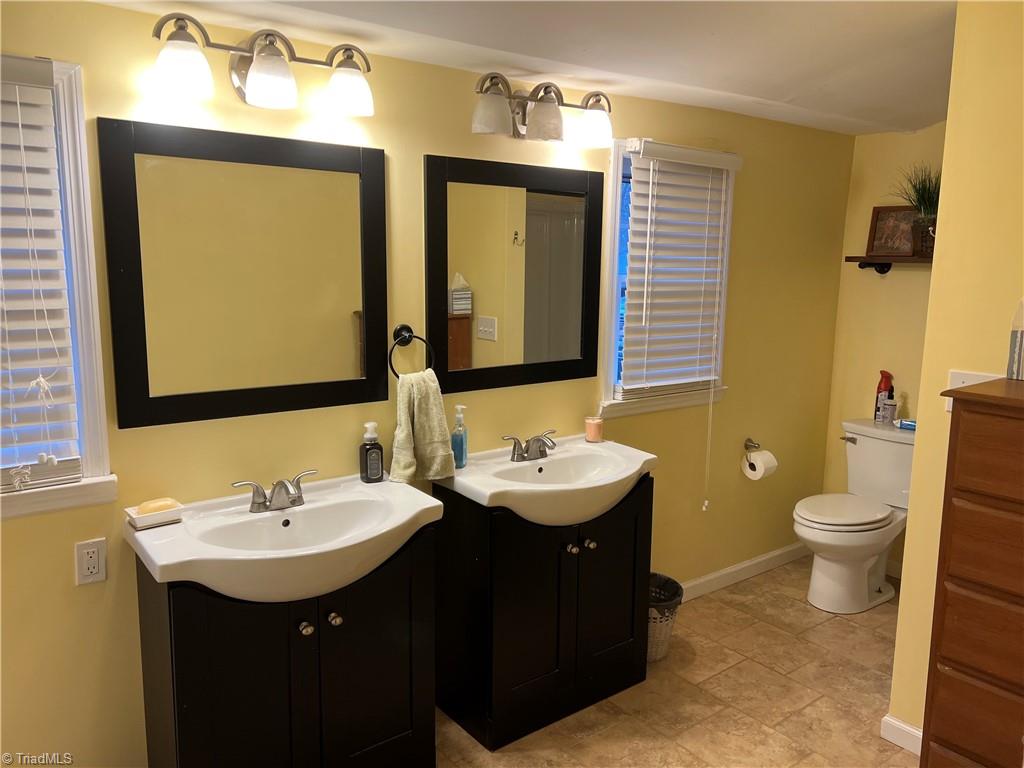 1085 Tom Gordon Road King, NC 27021 - Photo 10 of 17 Front of house, acreage behind it