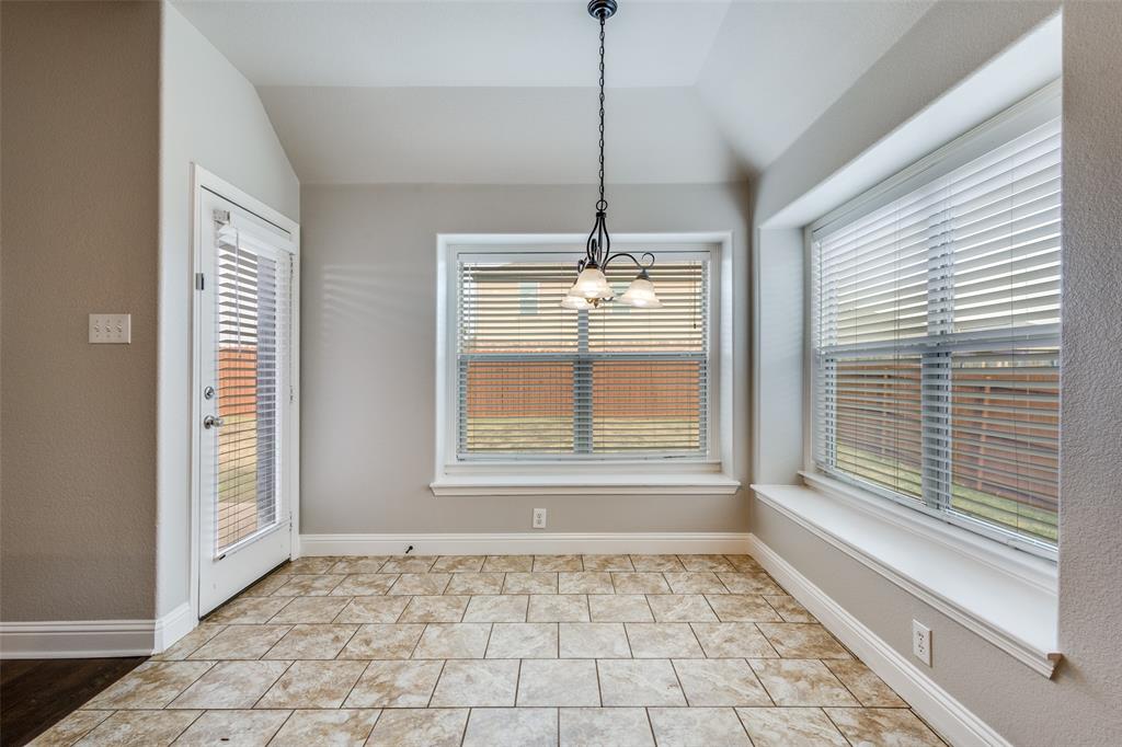 145 Mill Street Anna, TX 75409 - Photo 12 of 25 a view of an empty room with a window