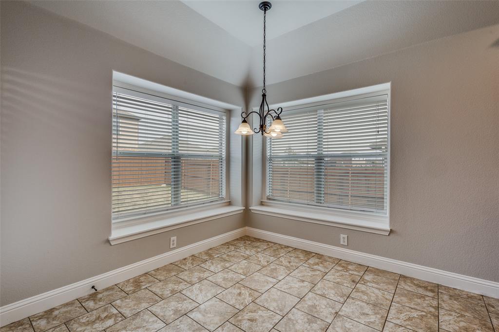 145 Mill Street Anna, TX 75409 - Photo 13 of 25 a view of an empty room with a window