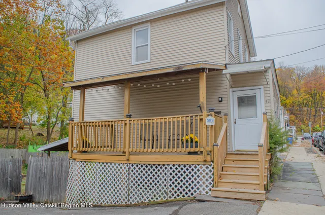 a view of a house with a deck