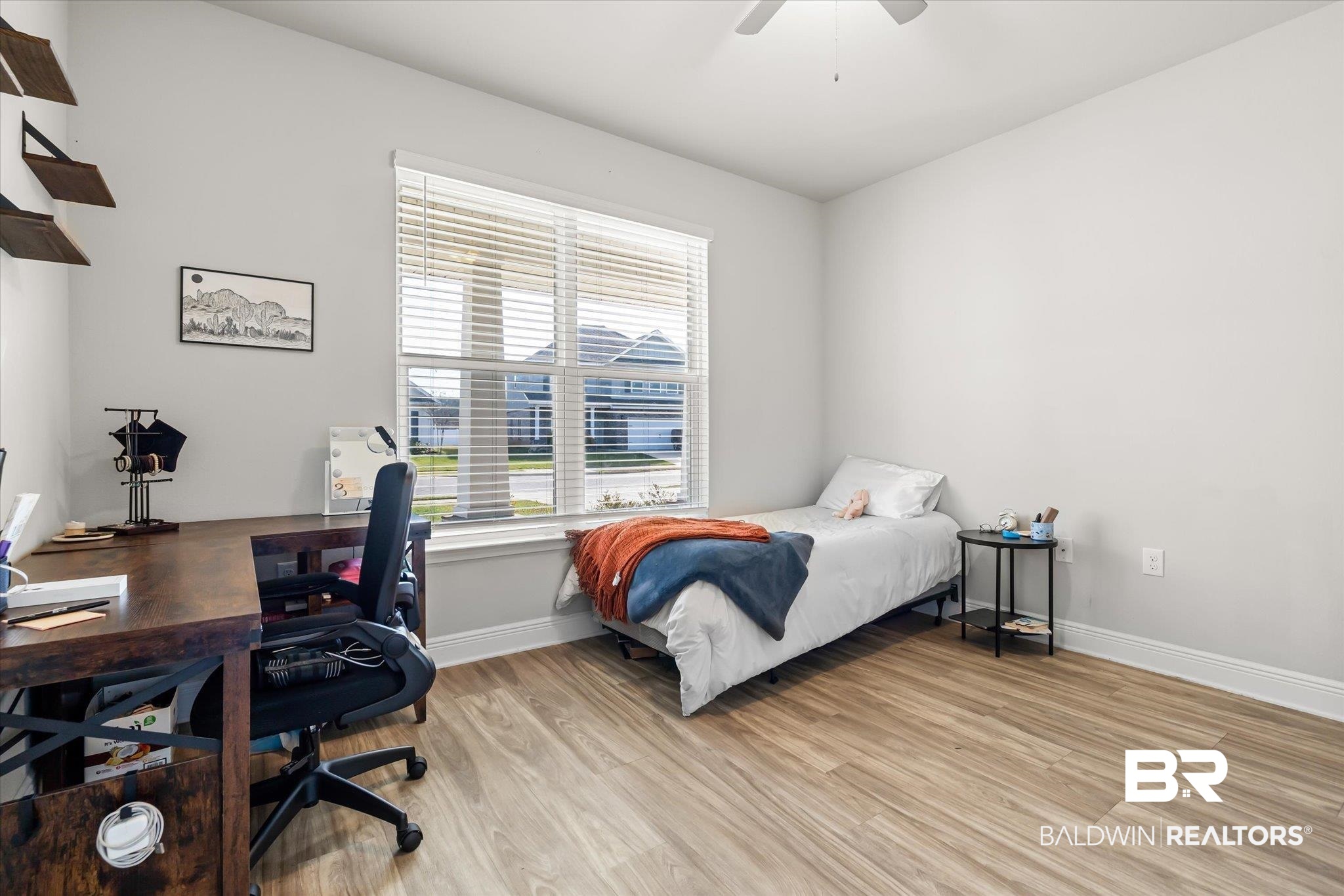 24262 Alydar Loop Daphne, AL 36526 - Photo 12 of 33 Bedroom featuring baseboards, ceiling fan, and light wood finished floors