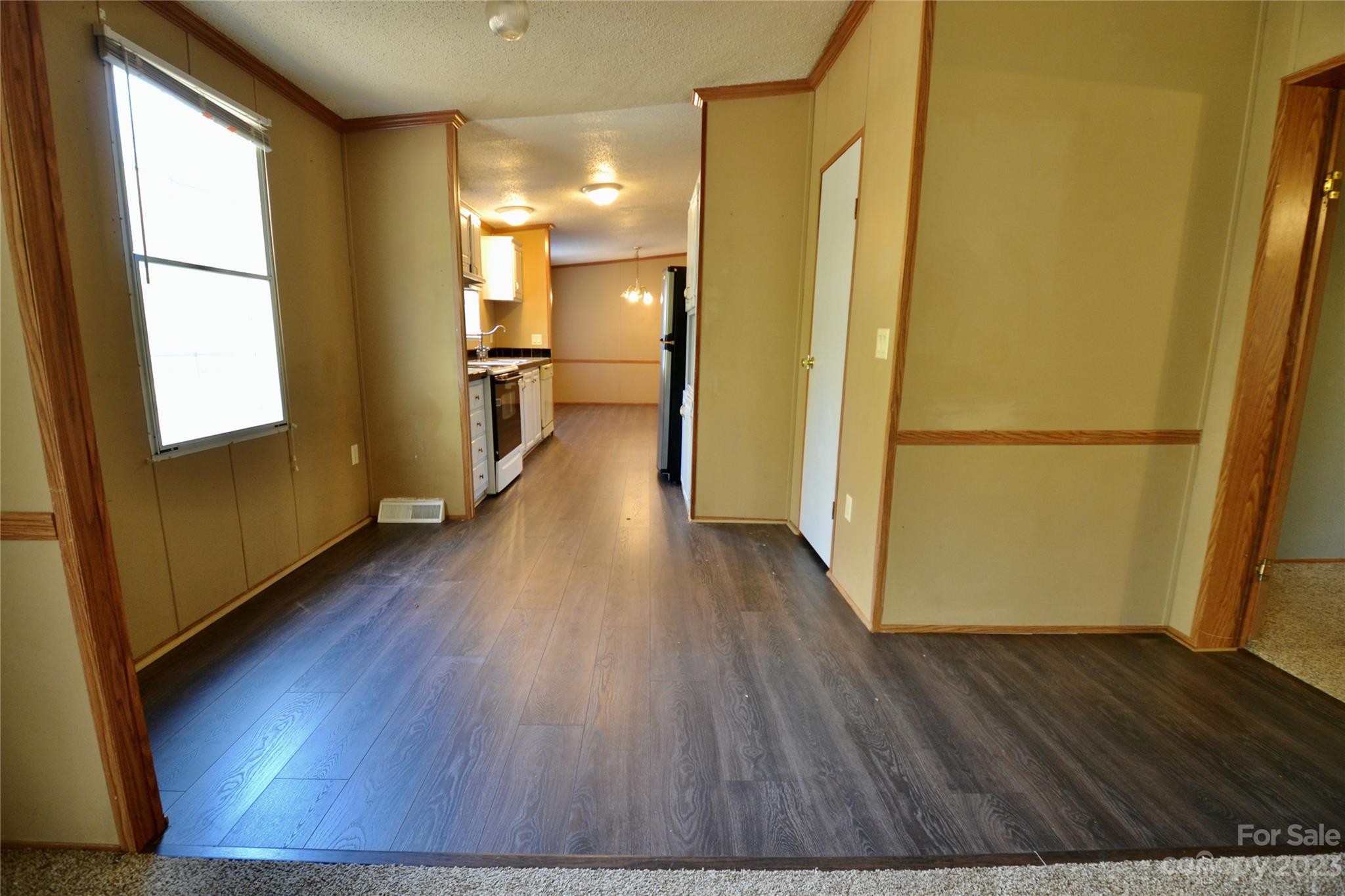 555 Kepley Road Salisbury, NC 28147 - Photo 13 of 39 a view of a kitchen with wooden floor and a window