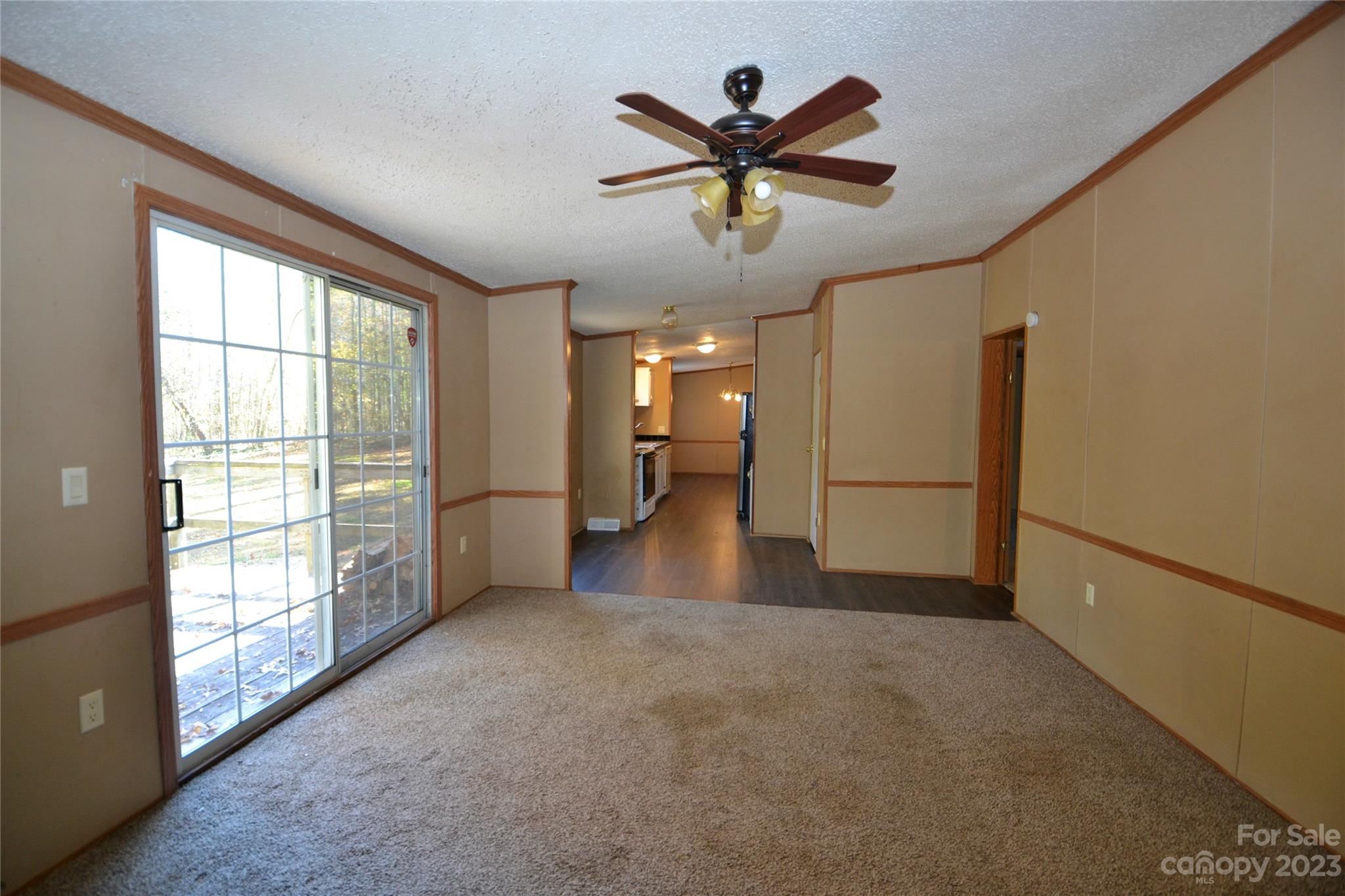 555 Kepley Road Salisbury, NC 28147 - Photo 17 of 39 a view of a livingroom with a ceiling fan and window